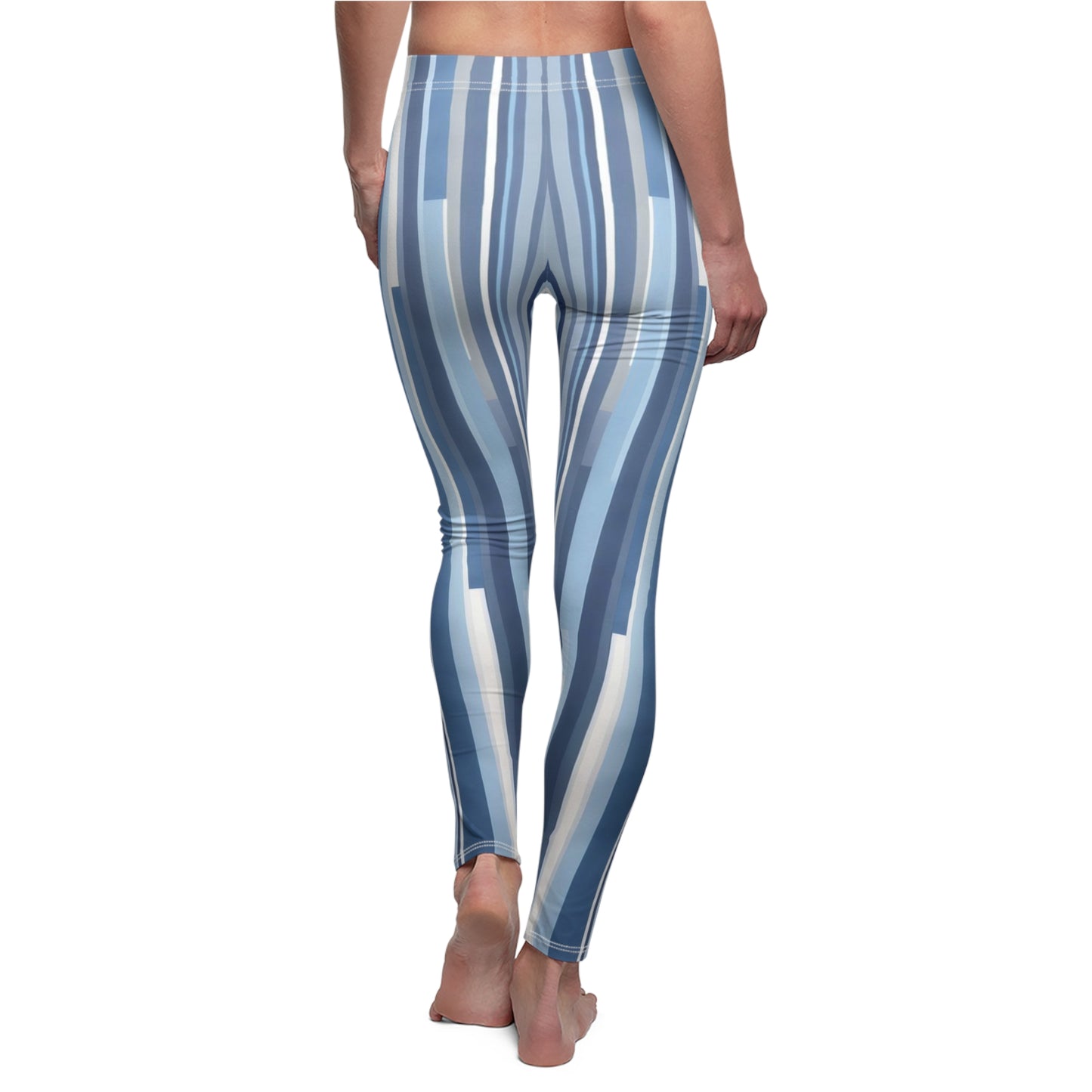 A pair of blue and white striped leggings on a model, back view.