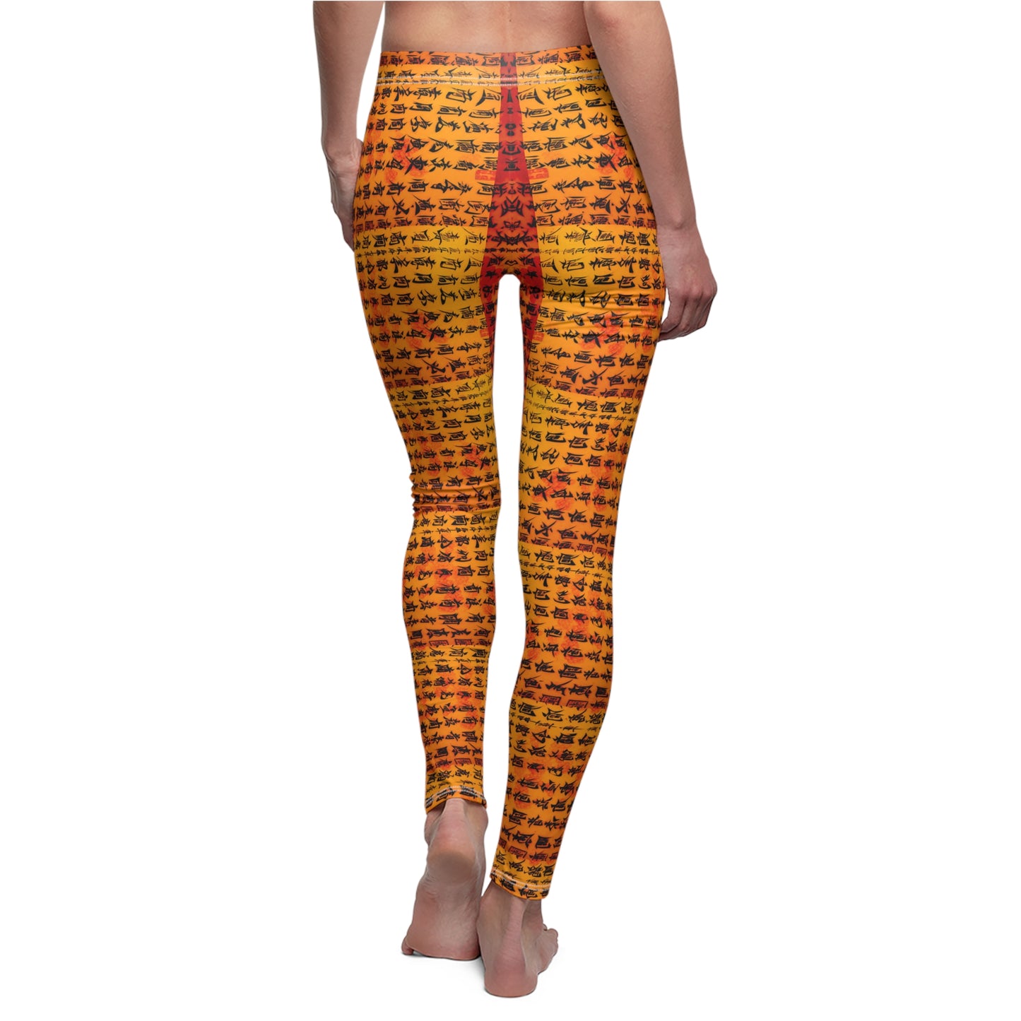 Back view of a pair of skinny fit leggings on a model featuring Chinese calligraphy with vibrant colors predominantly in orange and yellow tones.