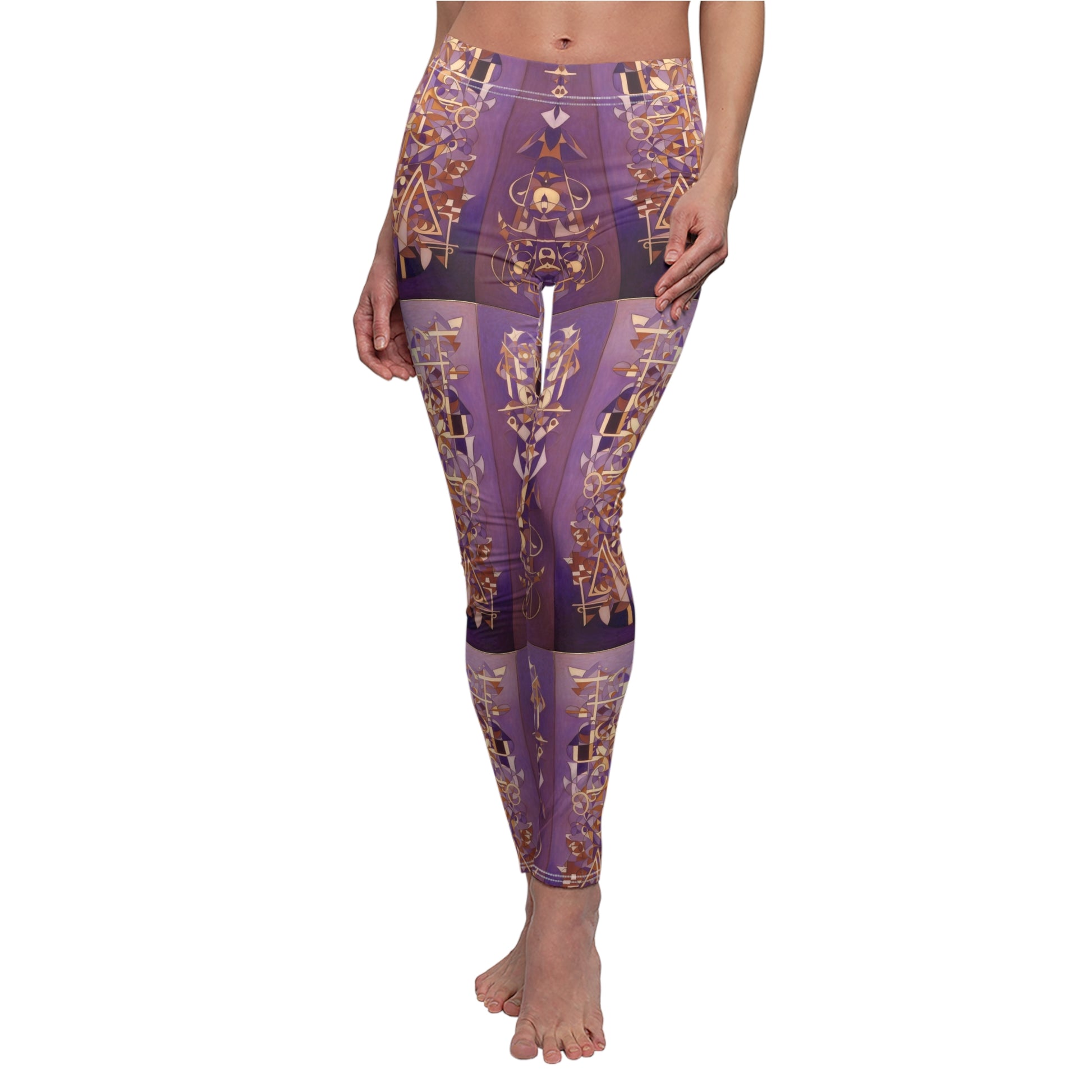 Model wearing skinny fit leggings, shades of purples with gold and white geometric patterns, front view.