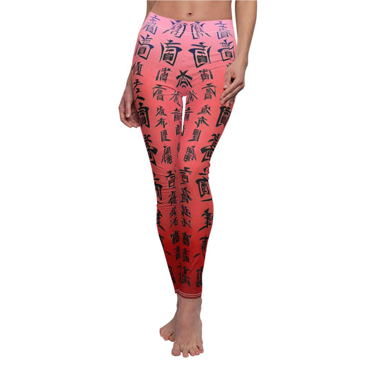 Model wearing  pair of pink elastic skinny fit leggings with a black all-over print featuring what appears to be Chinese characters.
