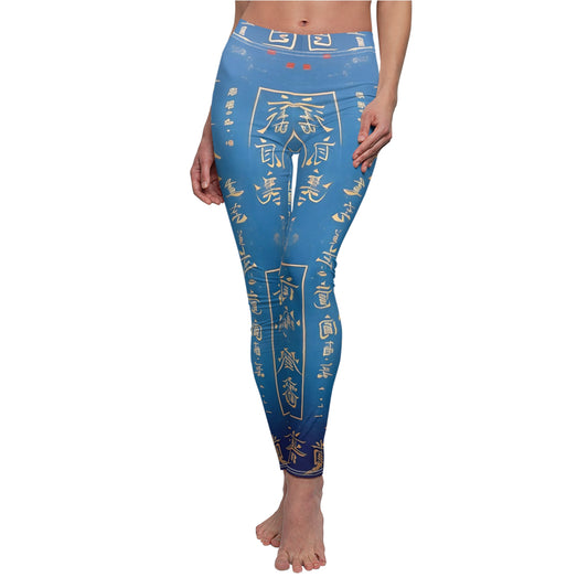 Baby blue skinny fit leggings with all-over print design of gold Chinese lettering - front view - worn by model.