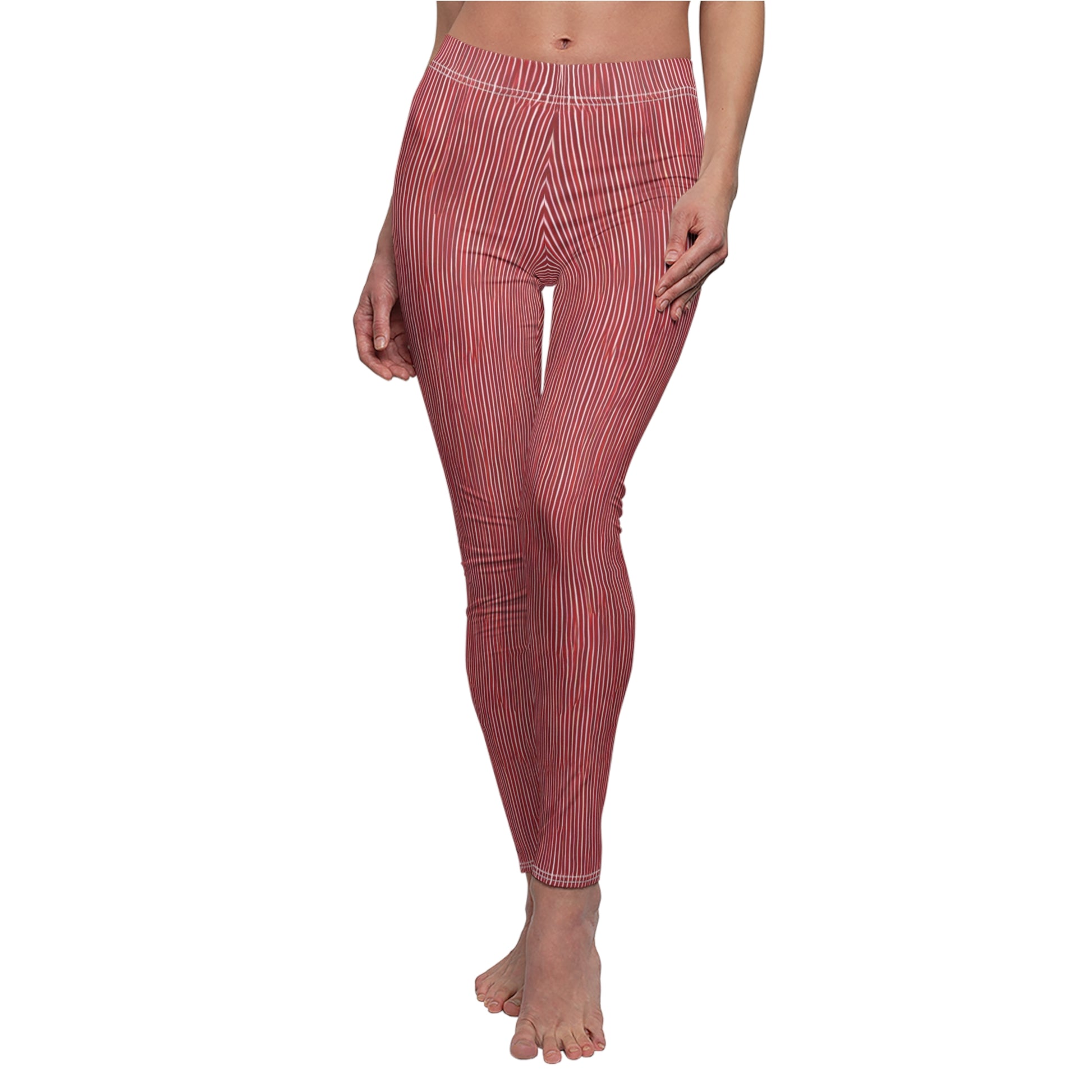 A pair of elastic skinny fit leggings with a red and white striped pattern.