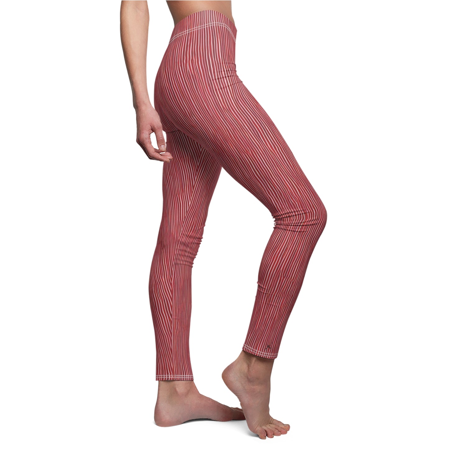 A pair of elastic skinny fit leggings with a red and white striped pattern.
