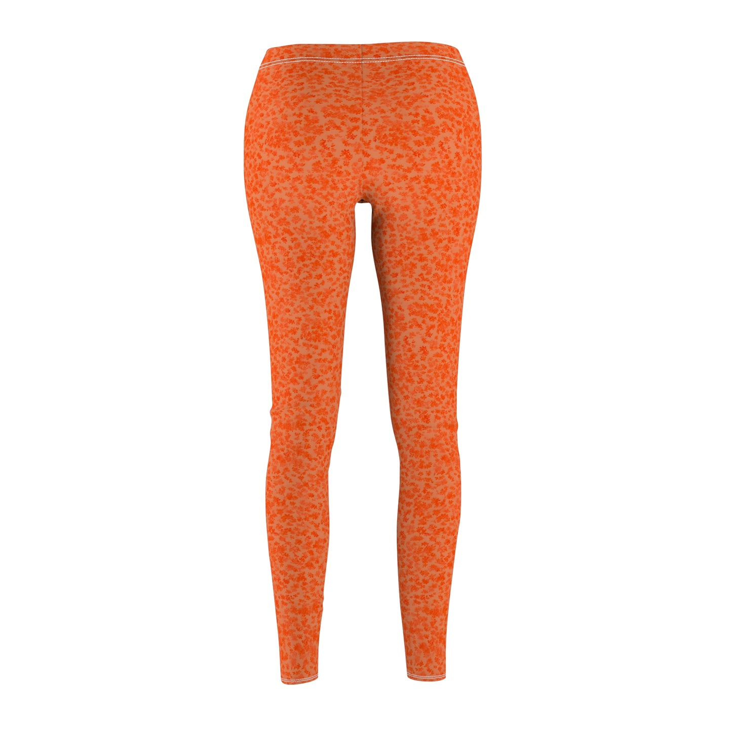 A pair of orange skinny fit leggings with a pattern, made from polyester and spandex fabric. Back view.