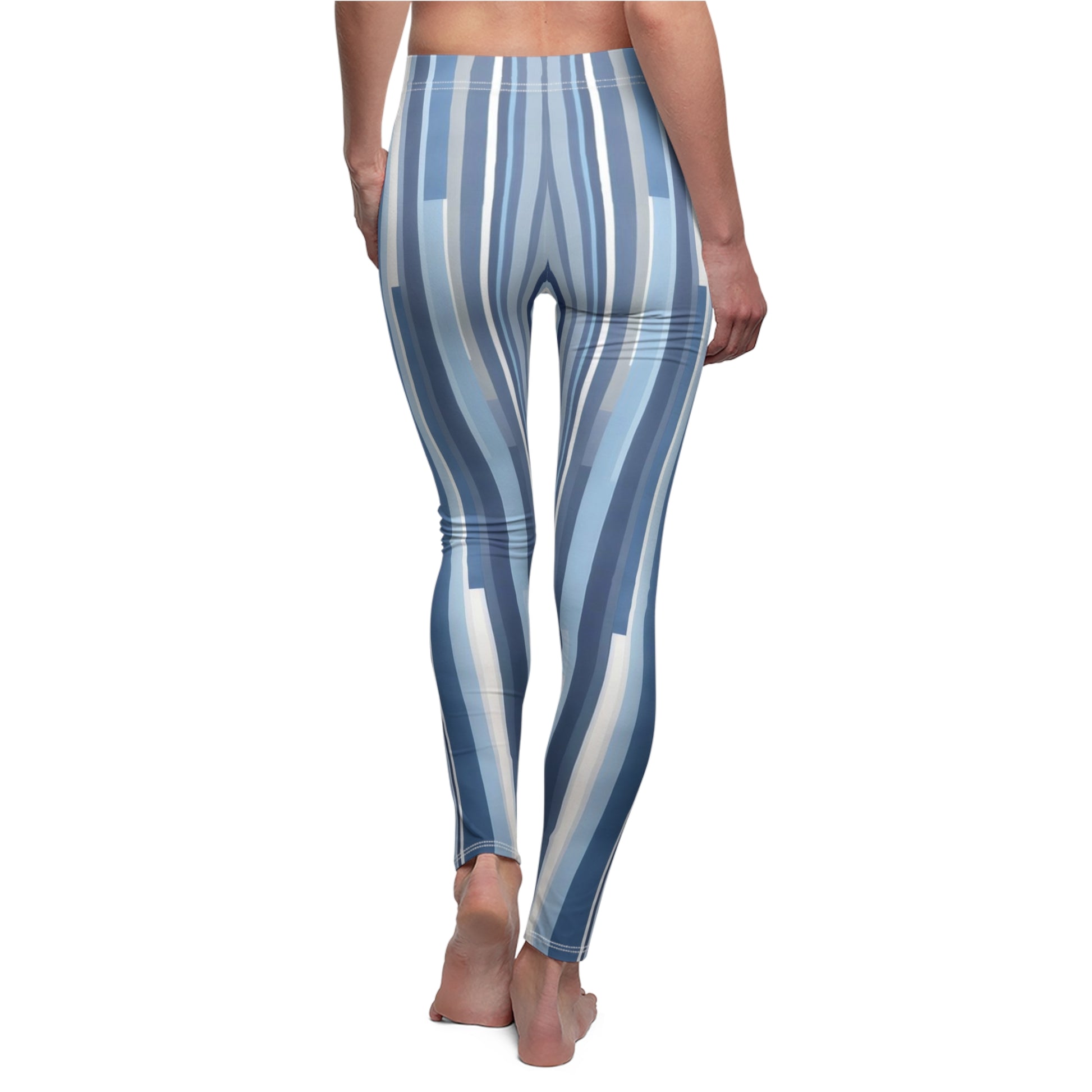 A pair of blue and white striped leggings on a model, back view.