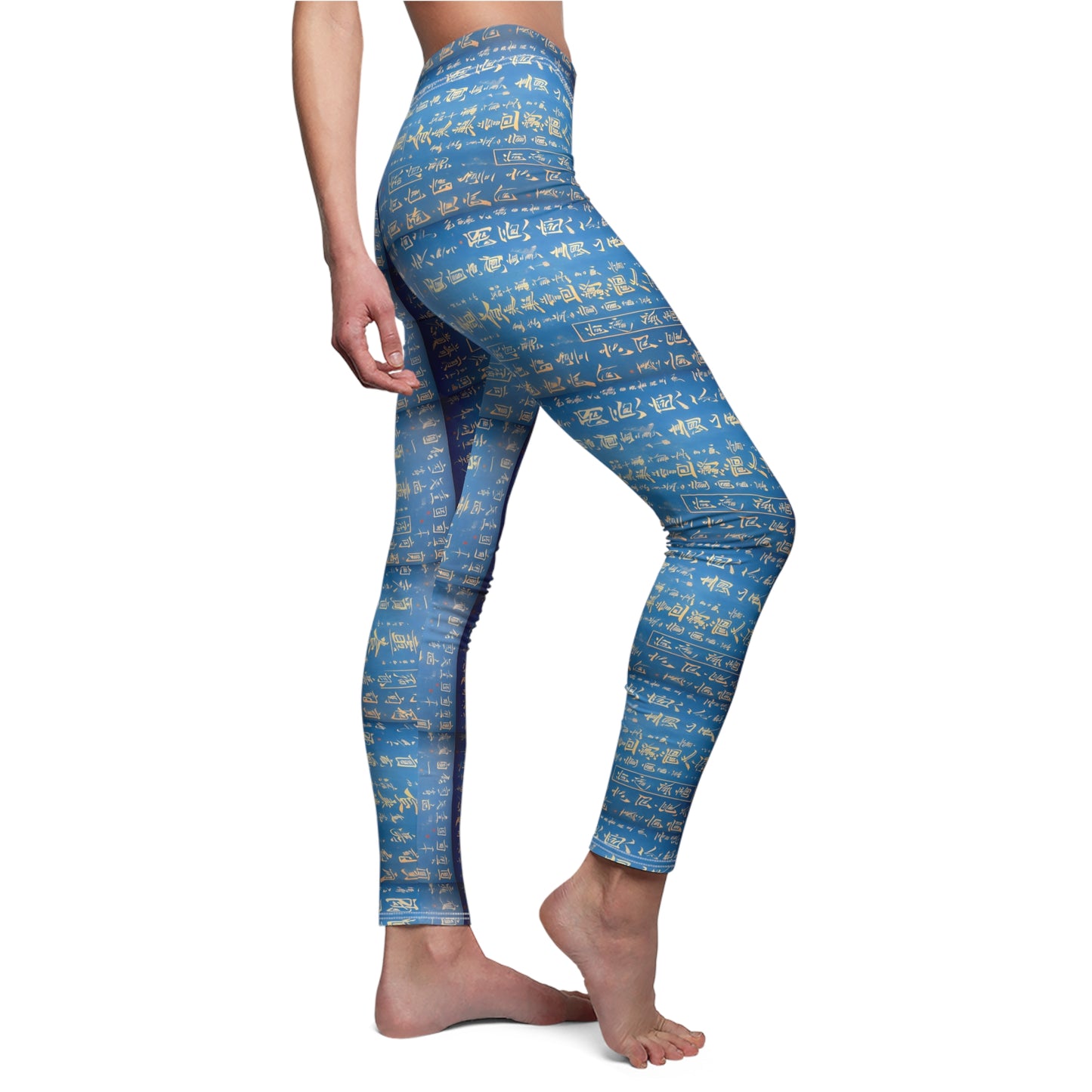 A pair of blue leggings worn by model, side view, covered in gold Chinese writing, showcasing the product's skinny fit and vibrant color.