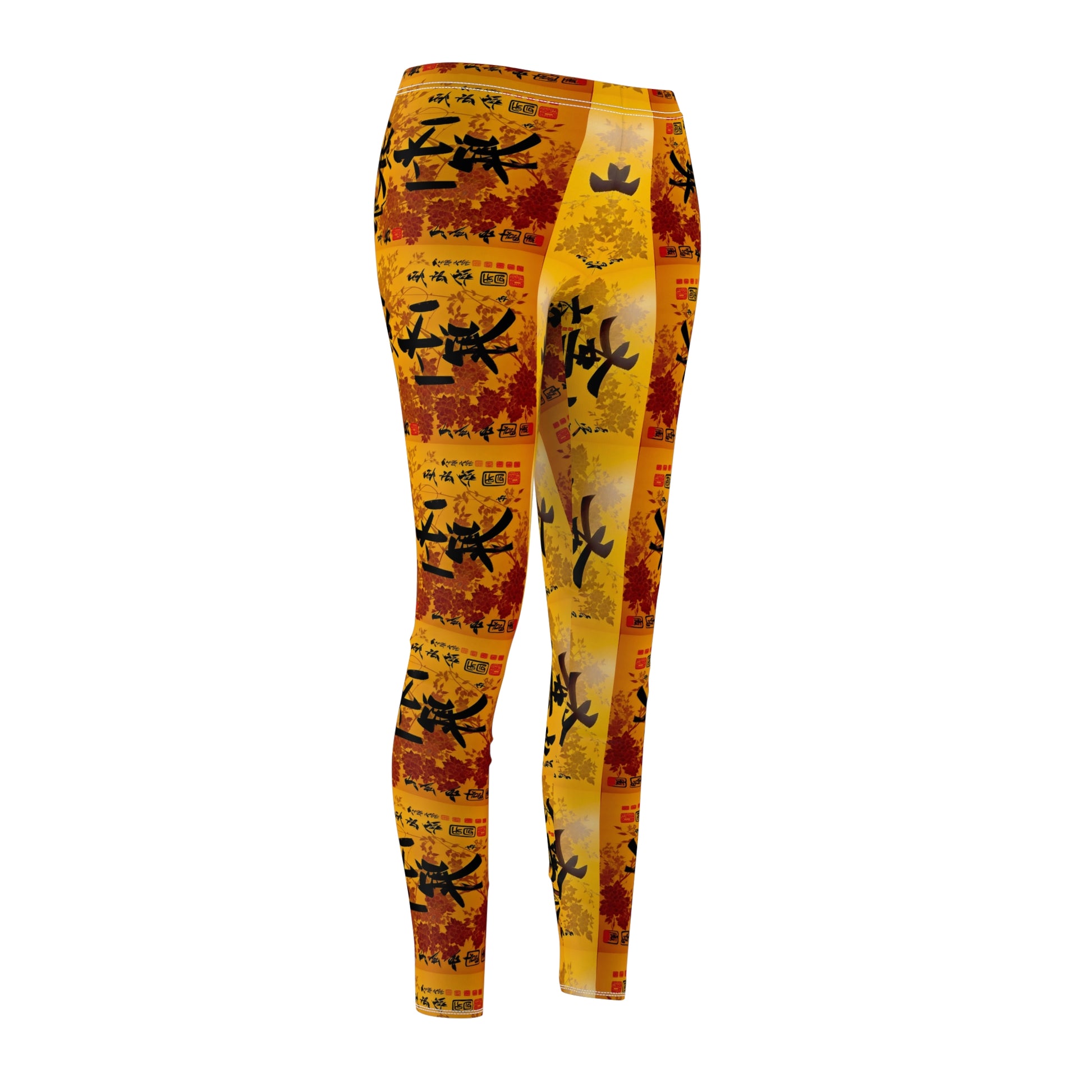 A pair of skinny fit leggings featuring a colorful all-over print, with a gold, black and orange Oriental design, front side view.