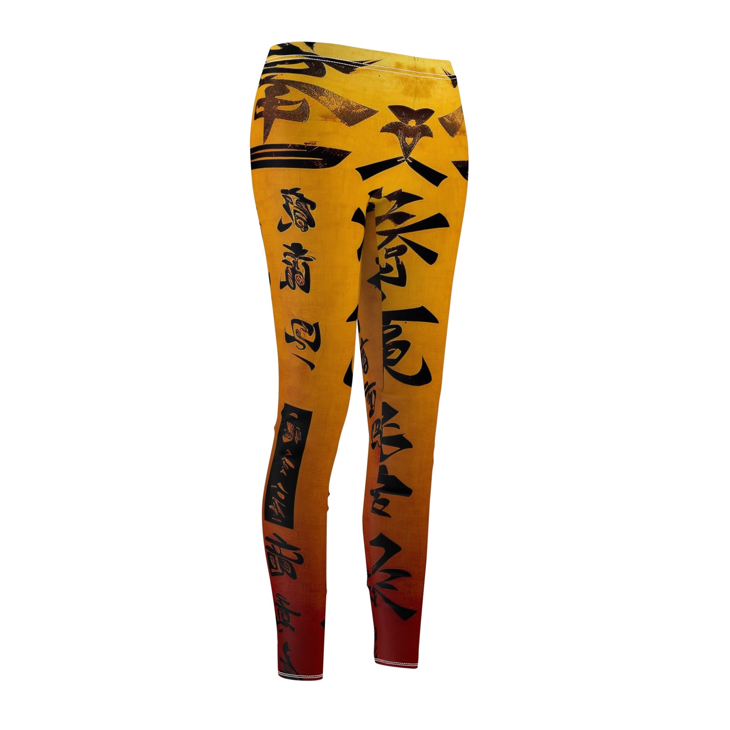 Front side view of a pair of skinny fit leggings featuring a gold color with black geometric patterns and a visible white thread color.