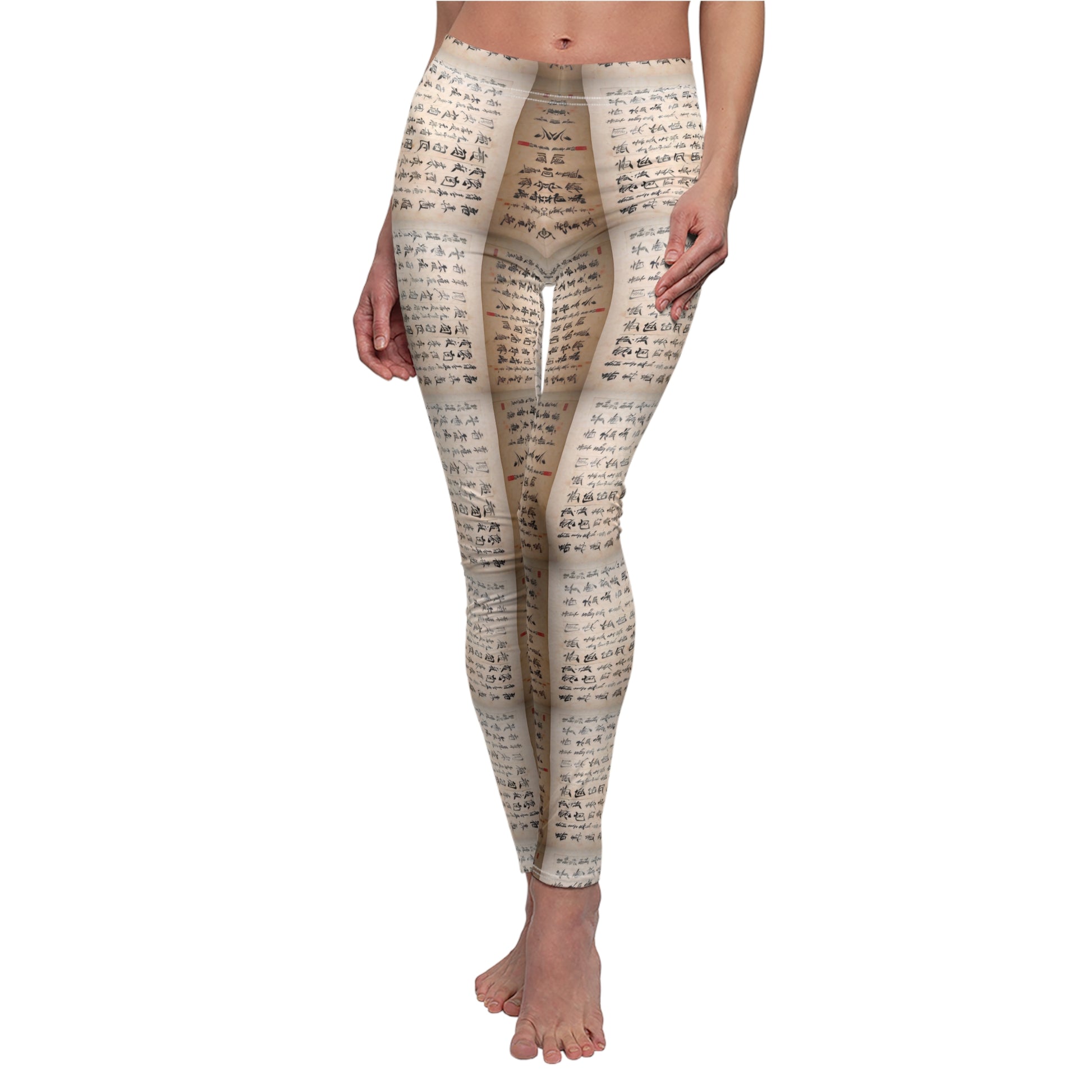 A pair of white elastic skinny fit leggings with an all-over print featuring text.