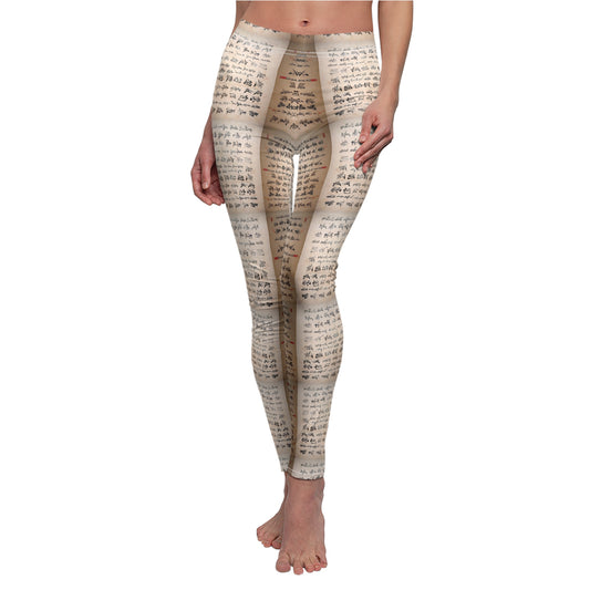 A pair of white elastic skinny fit leggings with an all-over print featuring text.