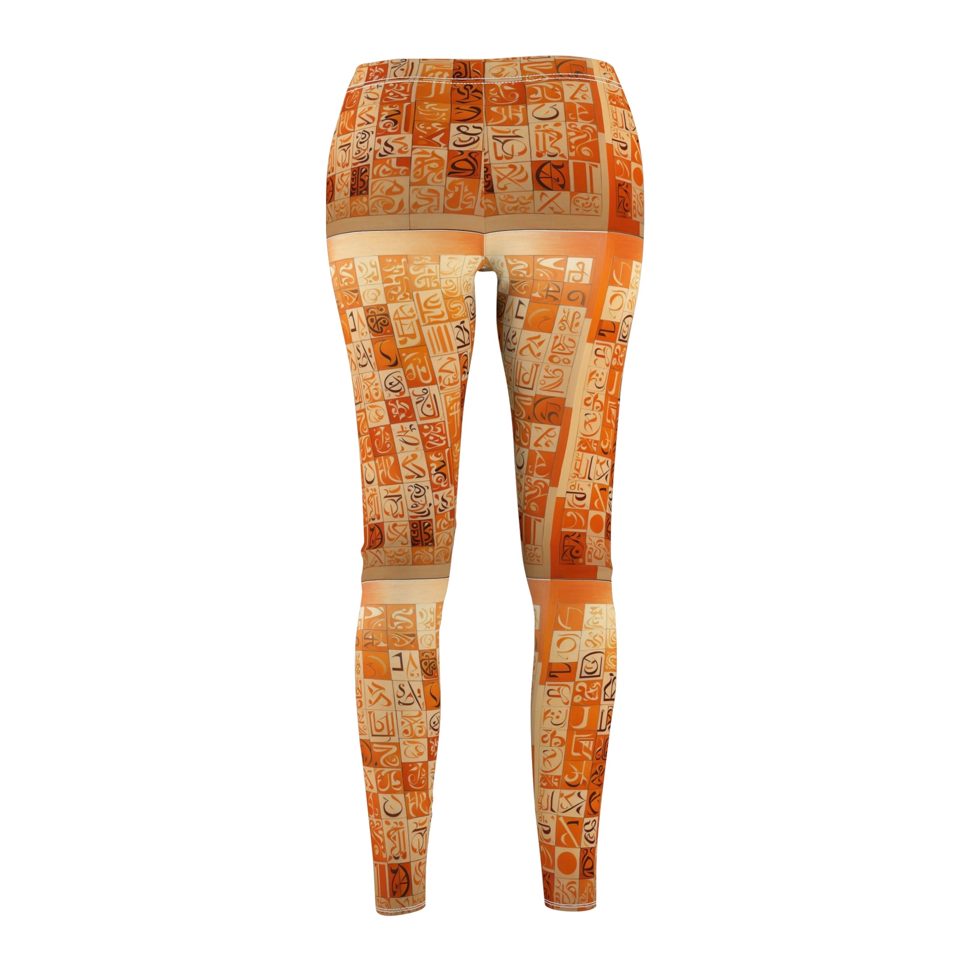 A pair of skinny fit leggings with geometric patterns in orange, creams, and browns with black and cream calligraphy, back view.