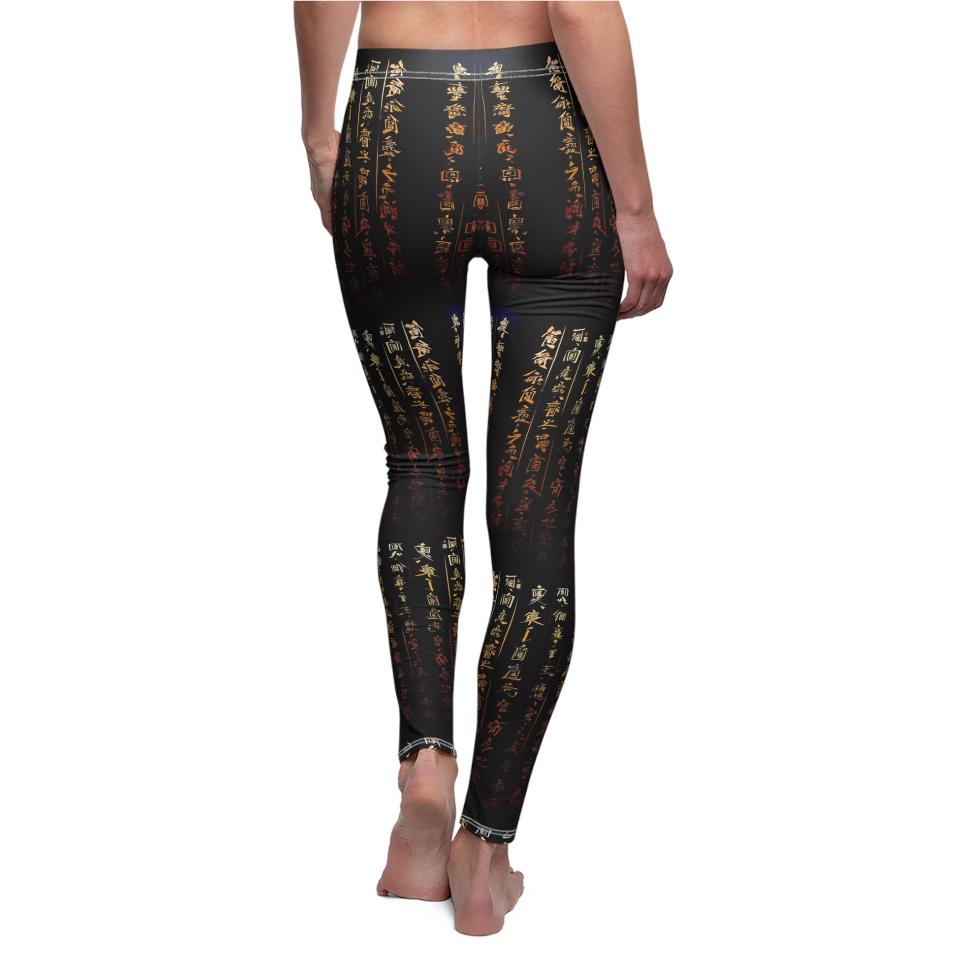 Back view of model wearing a pair of black activewear leggings with a gold all-over Chinese calligraphy print, featuring a skinny fit design.