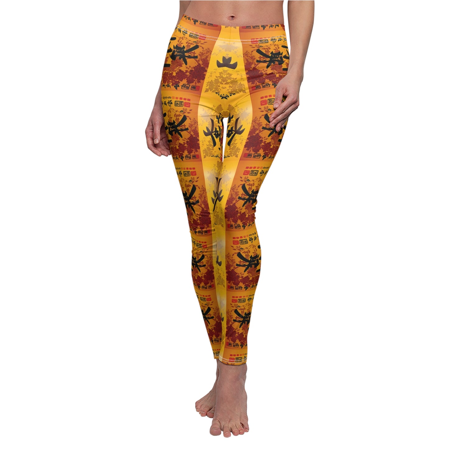 A pair of skinny fit leggings featuring a colorful all-over print, with a gold, black and orange Oriental design.